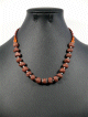 Collier ethnique artisanal 19 pierres marron de 1cm agremente de fines perles argentees
