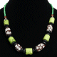 Collier ethnique artisanal imitation pierres cylindrees multicolores agencees de perles vertes et noires