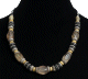 Collier ethnique artisanal imitation pierres en verre agrementees d'armatures argentees et de perles noires