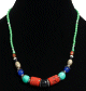 Collier ethnique artisanal imitation pierres multicolores et perles vertes, argentees et en bois